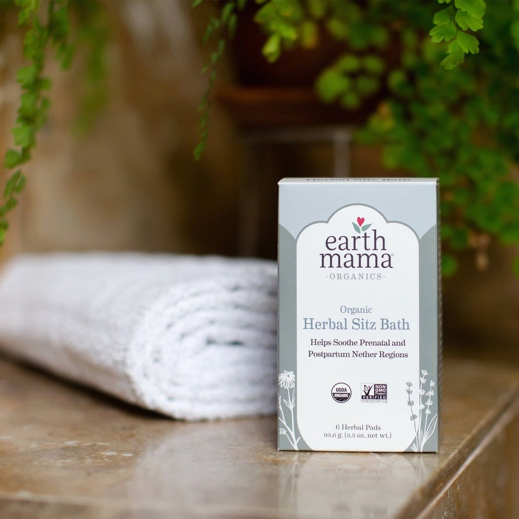 White towel and box of earth mama organics organic herbal sitz bath.