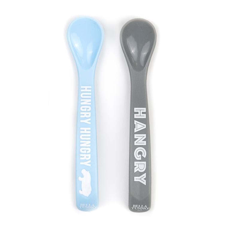 2 Bella Tunno themed silicone and ergonomic spoons. One is light blue and says Hungry Hungry hippo and the other is grey and says Hangry.