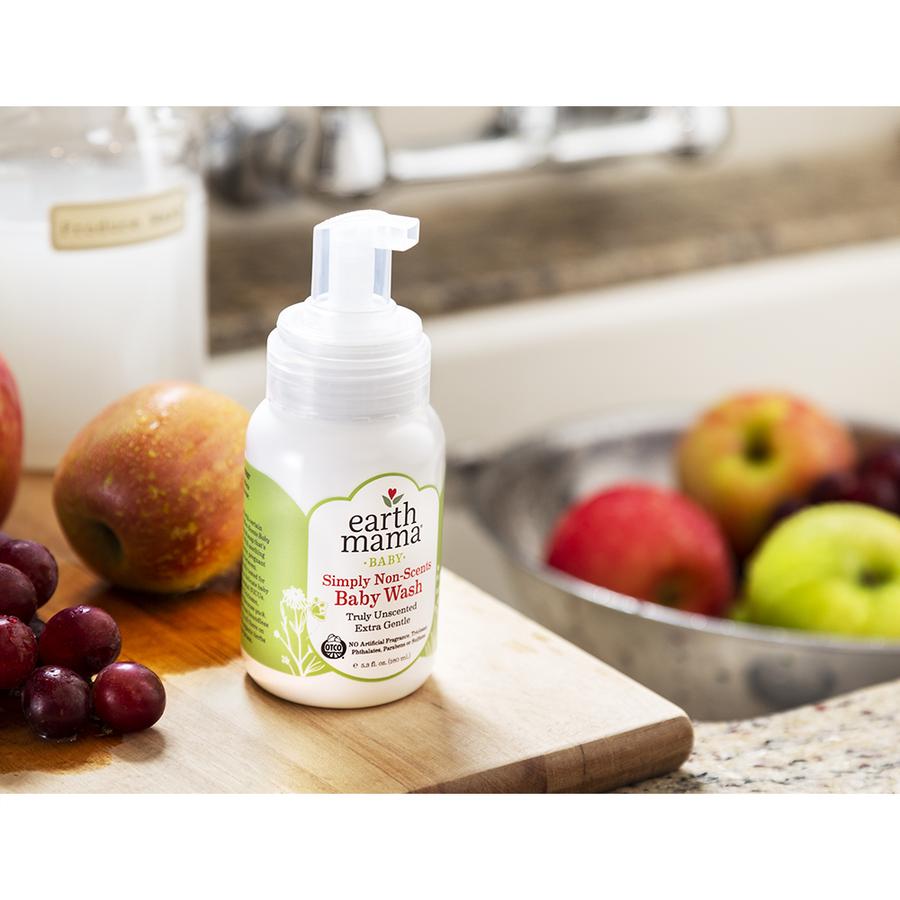 Earth mama baby simply non scents castle baby wash bottle on counter.