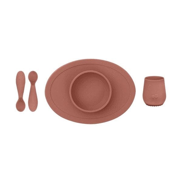 ezpz sienna coloured first food set including a silicone suction bowl, 2 silicone spoons and a silicone cup