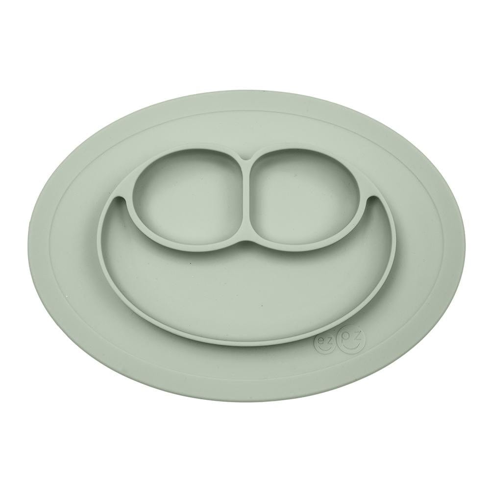Sage green ezpz mini mat that suctions to a surface with 3 individual compartments. 