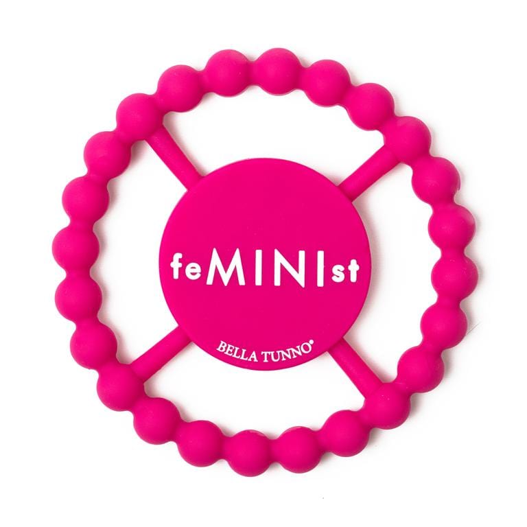 Bella Tunno bright pink teether ring with the word Feminist in white. 