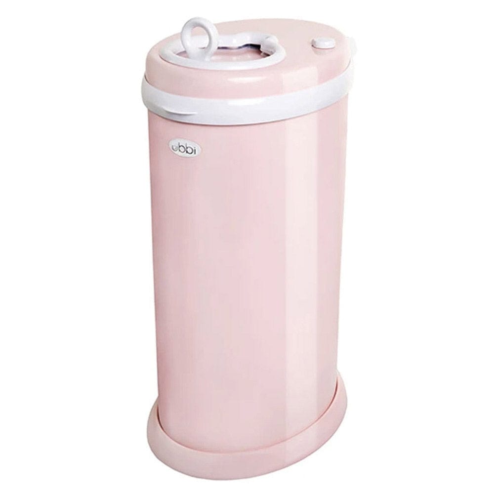 UBBI's diaper pail with an innovatively designed lid in the color blush pink with white trim.