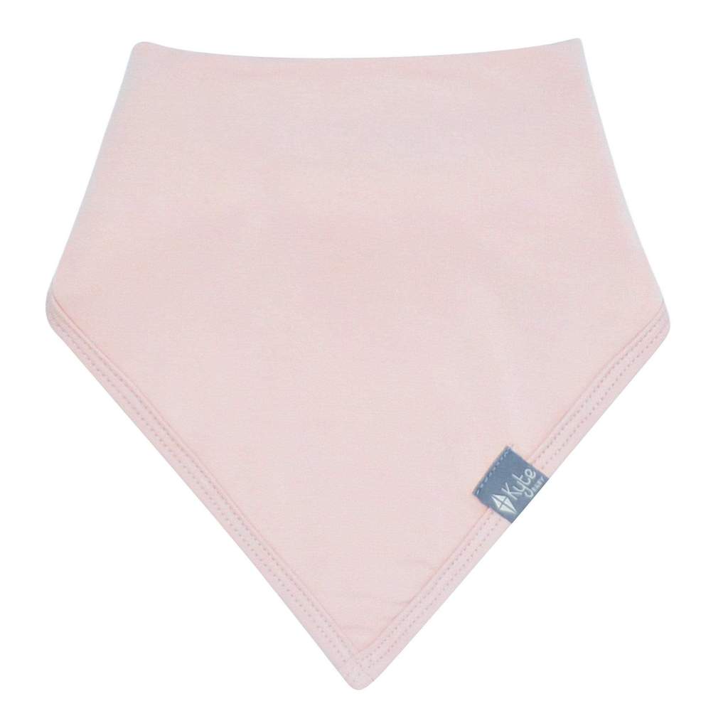 Kyte Baby handkerchief style drool bib in blush pink.