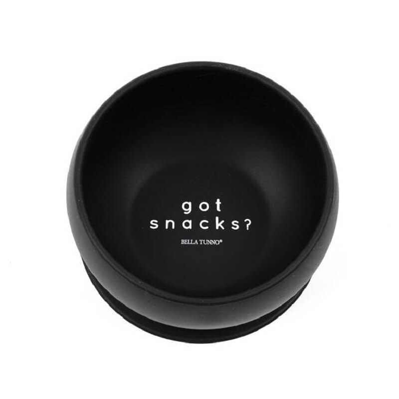 Bella Tunno's Wonder bowl that suctions to flat surfaces. Black and says, "Got snacks?" written in white lettering.