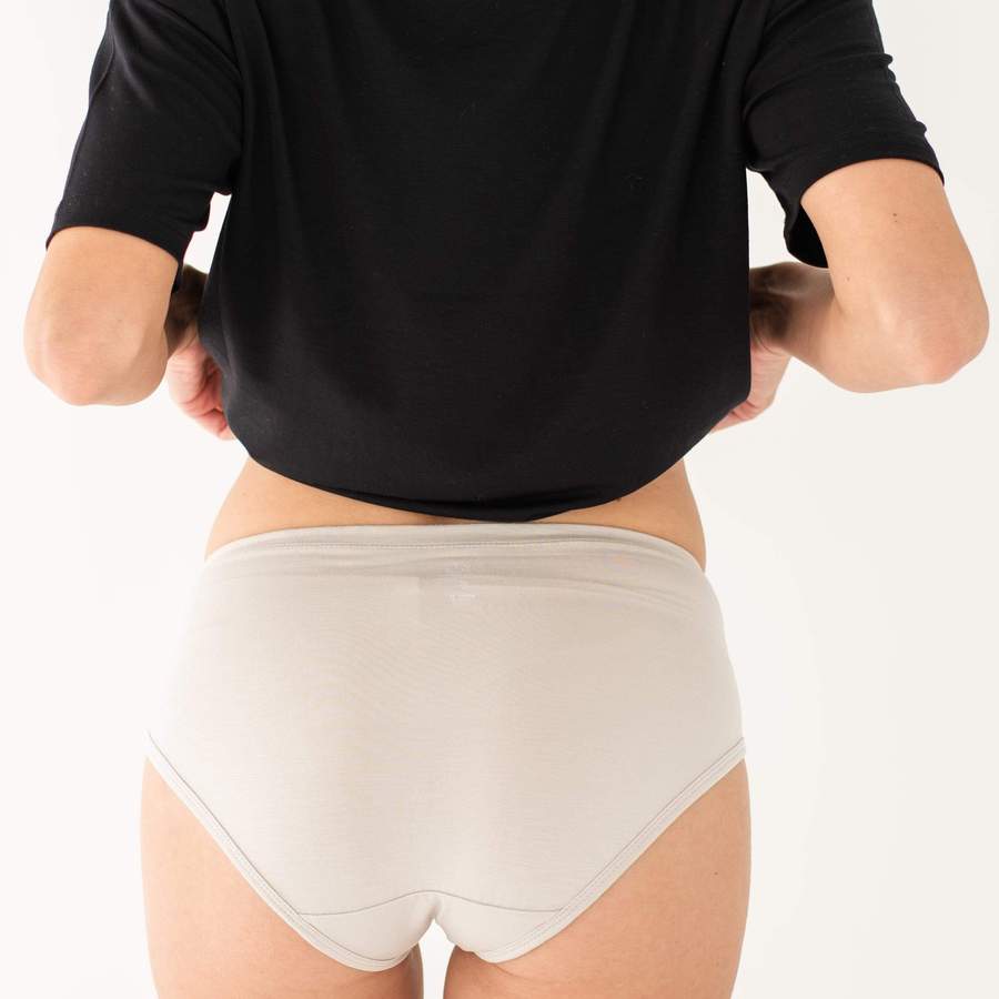 Kyte womens underwear are full coverage and shown here on the model.